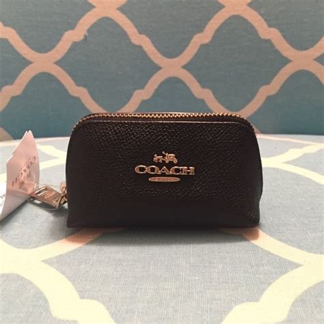 small coach cosmetic pouch.